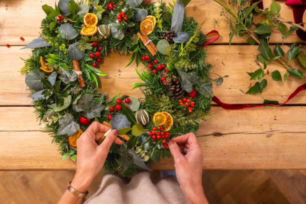 istock Hand-making Christmas Wreaths 2152030113