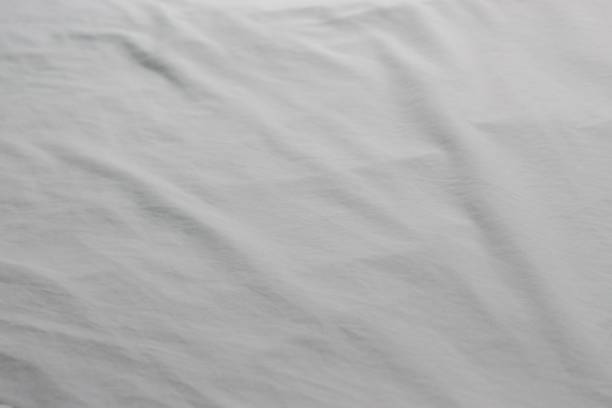 istock Textured background of a sheet on a bed 2152030130