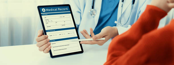 istock Laptop display medical report on blurred doctor office. Rigid 2152032759