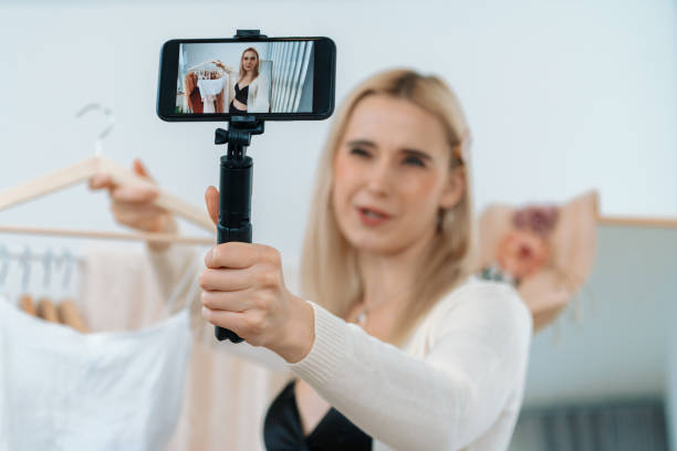 istock Young woman making fashion video content for social media. Blithe 2152034205