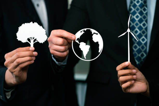 istock Group of business people holding alternative net zero energy icon. Quaint 2152035246