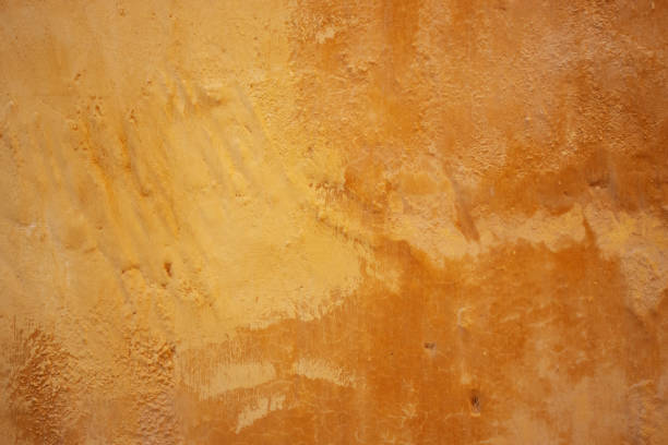 istock detail of stone and cement wall with peeling paint texture 2152035520
