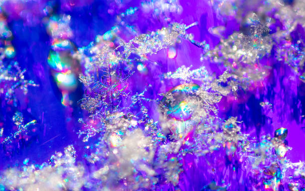istock Close-up of snowflakes on a blue background. Macro 2152035858