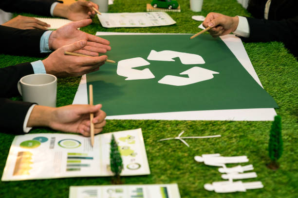 istock Recycle icon on meeting table with business people. Quaint 2152037644