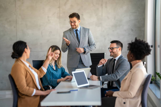 istock Multicultural professional businesspeople working together on research plan in boardroom. 2152038119