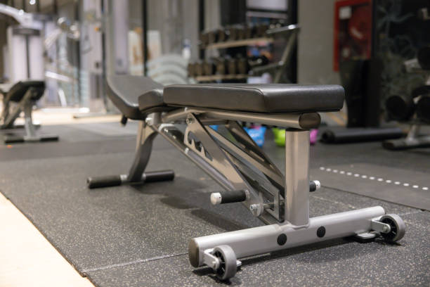 istock A bench is in a gym with a black and silver color 2152038835