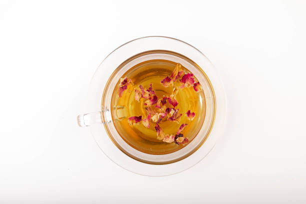 istock Tea made from tea rose petals in a glass bowl on white background. 2152040871