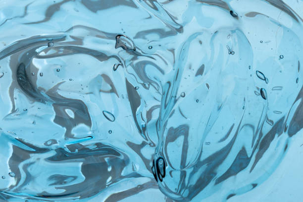 istock Abstract cosmetic background from transparent gel or antiseptic, hyaluron 2152041228