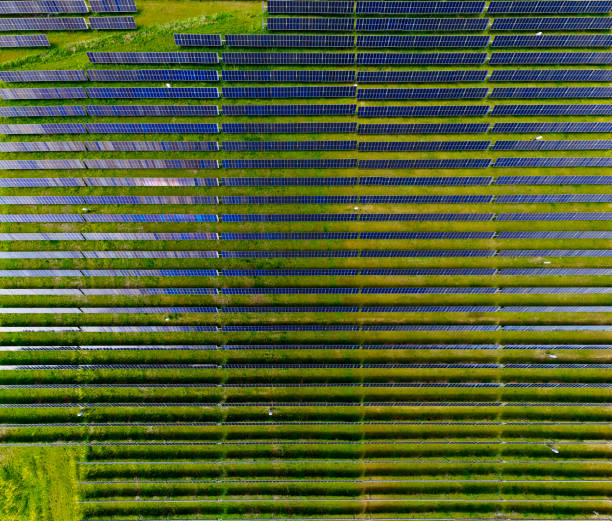 istock Aerial view of field with solar panels 2152042052