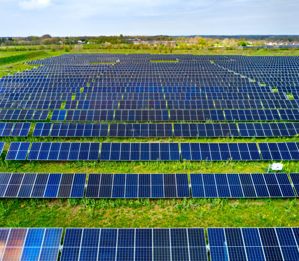 istock Aerial view of field with solar panels 2152042149