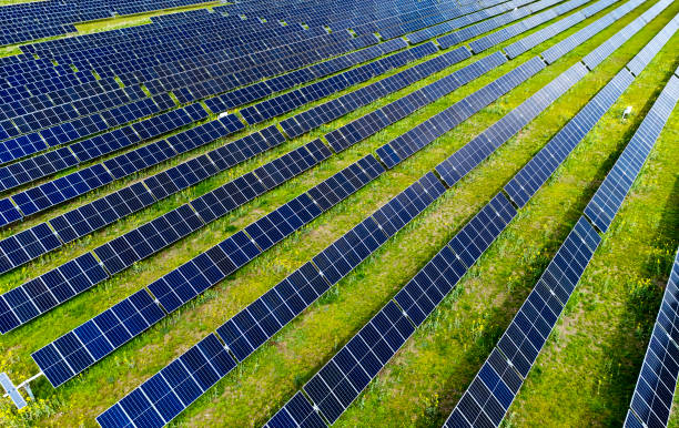 istock Aerial view of field with solar panels 2152043750