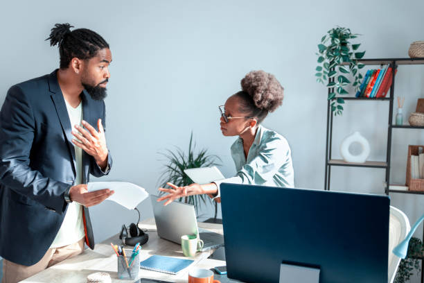 istock Man Frustrated with female co-worker 2152043808
