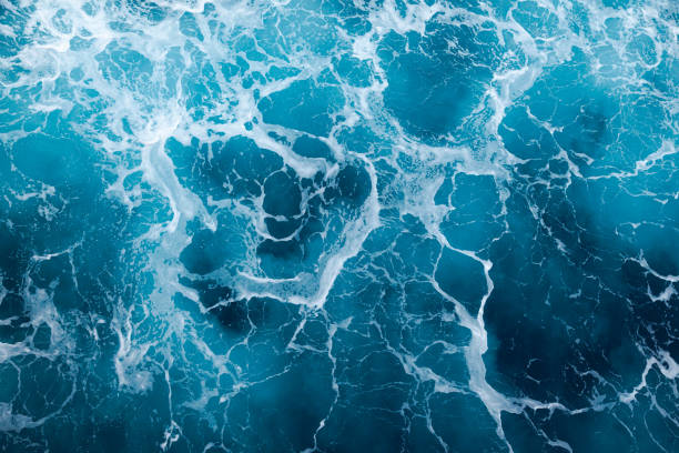 istock Ocean water background with foam. Ocean water splash. Not a calm 2152047532