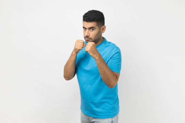 istock Confident serious man with clenched fists, being ready to attack, arguing with somebody. 2152049982