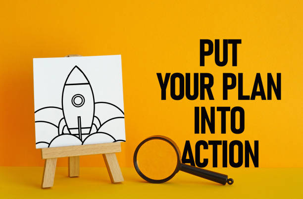 istock Put your plan into action is shown using the text and picture of the rocket 2152054048
