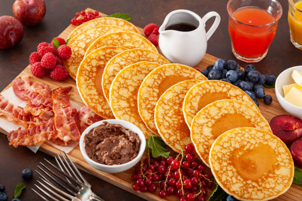 istock american pancake board with bacon berries maple syrup butter 2152063451