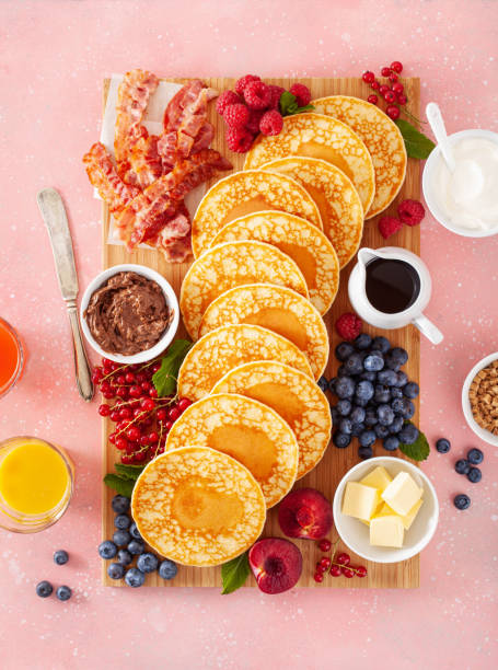 istock american pancake board with bacon berries maple syrup butter 2152063466