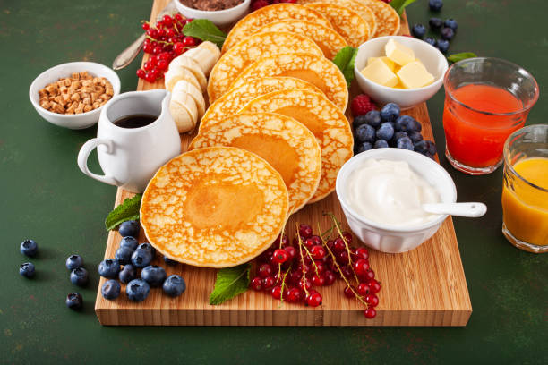 istock american pancake board with berries maple syrup butter 2152063494