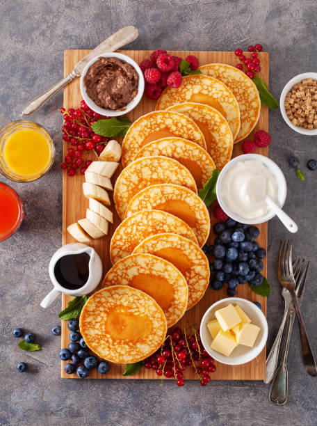 istock american pancake board with berries maple syrup butter 2152063505