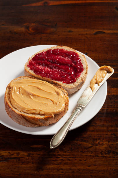 istock smooth peanut butter and jam bread toast, american traditional sandwich 2152063596