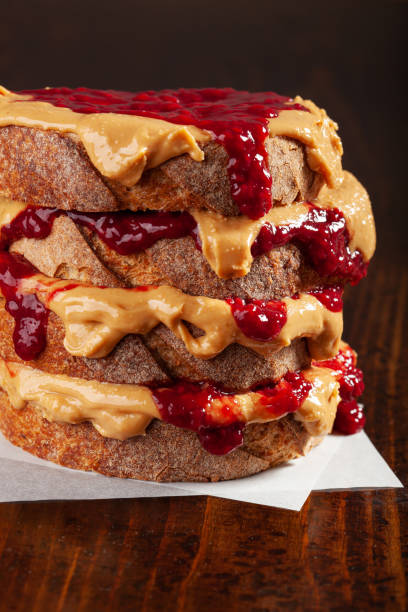 istock smooth peanut butter and jam bread toast, american traditional sandwich 2152063601