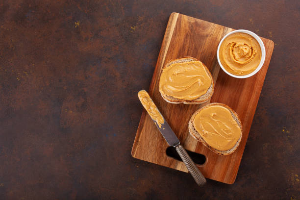 istock smooth peanut butter bread toast, healthy traditional sandwich 2152063630