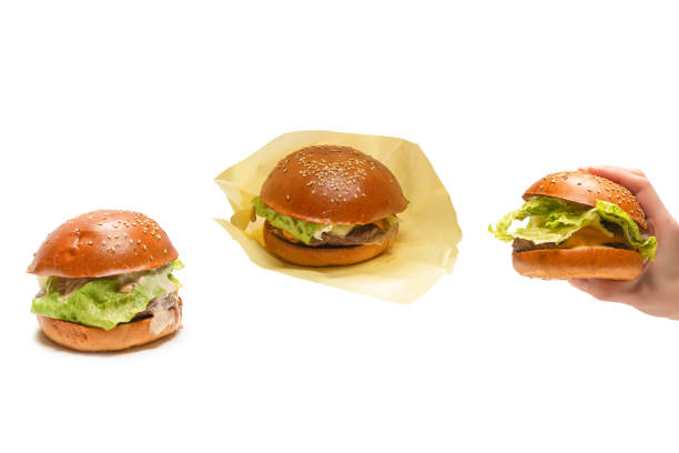 istock Hamburger in woman hands isolated on a white background. 2152064480