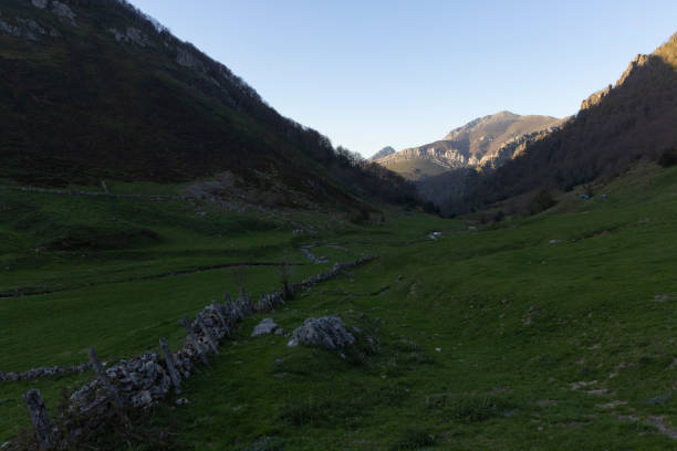 istock Mountain landscape with peak and cloud on a bright sunny spring day with green vegetation and blue sky in Picos de Europa National Park 2152065309