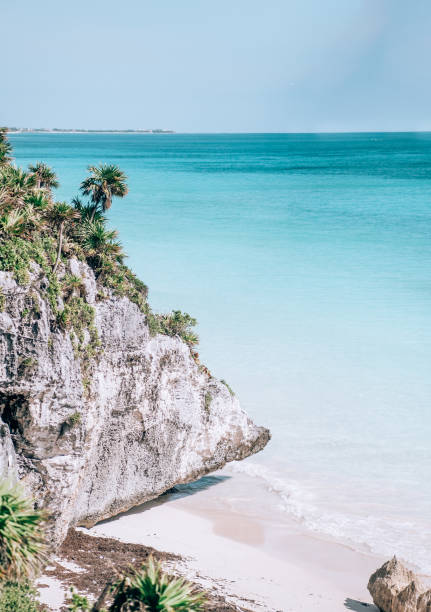 istock Serene Tulum beachscape with cliffs and turquoise water. 2152066779