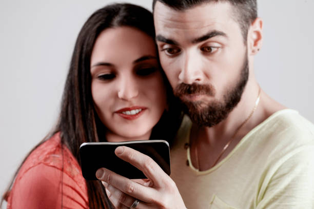 istock Happy couple engaged in digital entertainment 2152068293