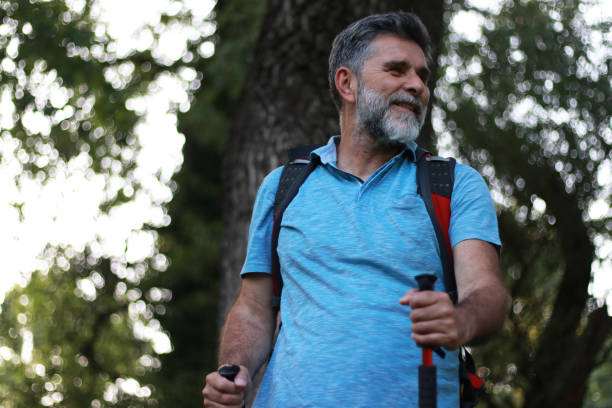 istock Hiking of mature man in forest 2152069462