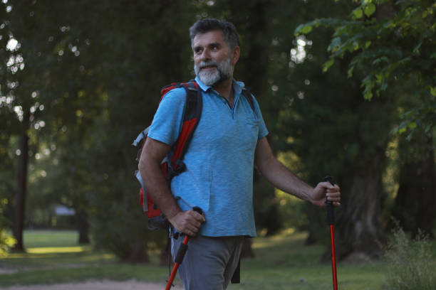 istock Hiking of mature man in forest 2152069497