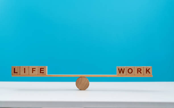 istock Wooden seesaw with word life and work 2152071346