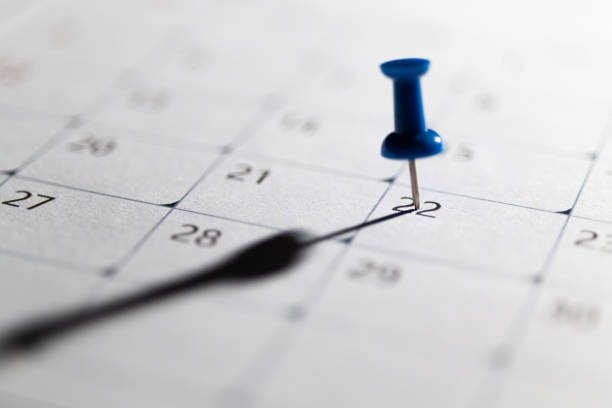 istock Embroidered pins on a calendar 2152071383