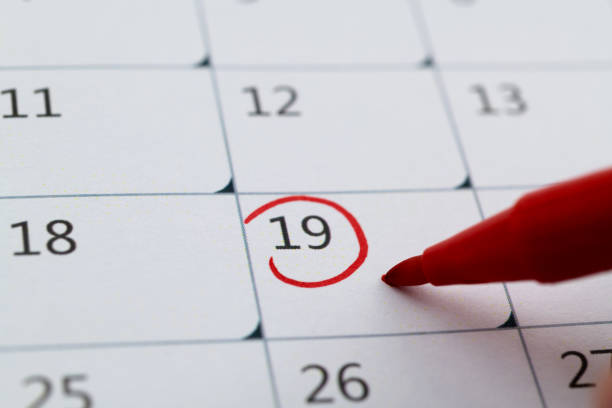 istock Red mark on the calendar at number 19 2152071393