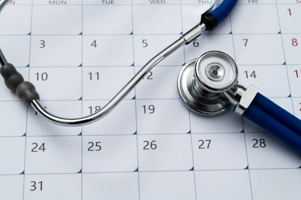 istock Stethoscope and pen on a calendar 2152071407