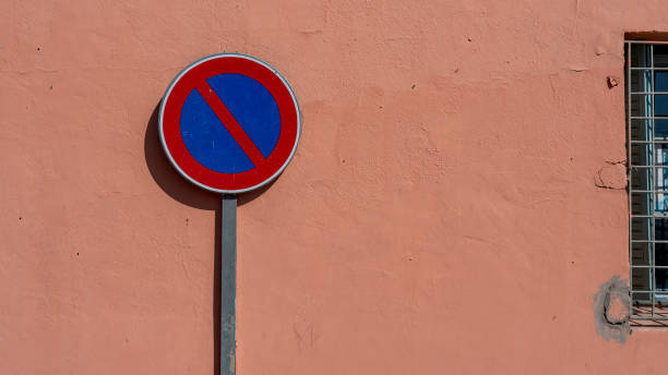 istock A no parking sign on the wall 2152074054