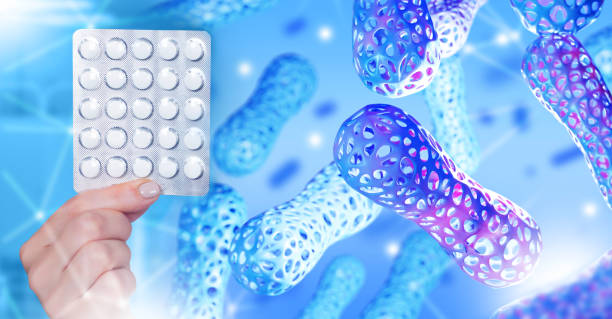 istock Probiotic tablets. Microbiota cells. Blister with vitamins in hand. Taking care intestinal microflora. Probiotics for digestion. Microbiota to improve functioning of body. Probiotic vitamins 2152077084