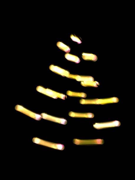 Colorful light christmas tree circle shape, pinetre shape, bright yellow  colour, light painting, night photo, creative photo,
