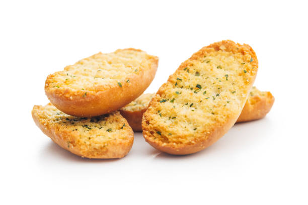 istock Garlic crisp bread Slices Topped With Herbs isolated on white background. 2152082157