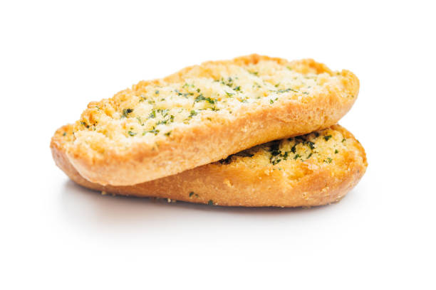 Garlic crisp bread Slices Topped With Herbs isolated on a white background.