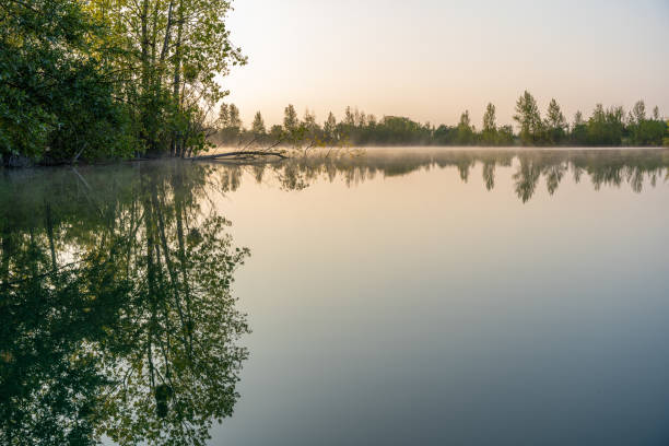 istock Serene Morning Reflections on a Calm Lake 2152095393