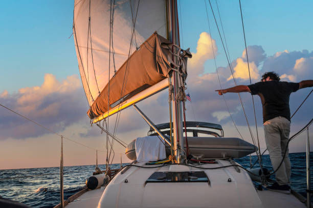 istock Sailor watching the environment on a sailboat. 2152095817