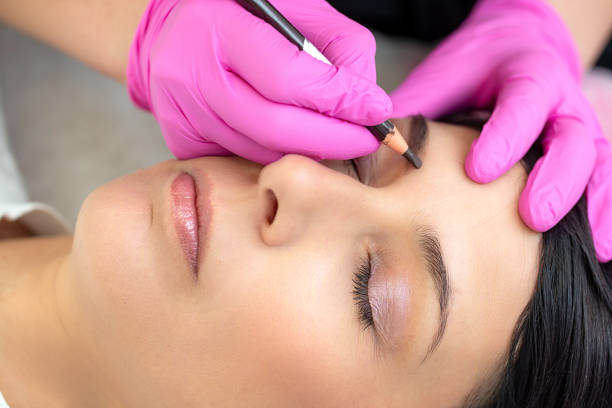 istock Powder brows treatment in a Spa saloon - side view 2152096553