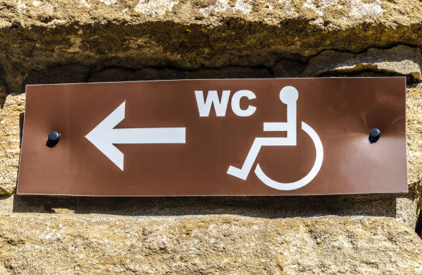 wheelchair symbol on blue background representing accessibility and inclusivity