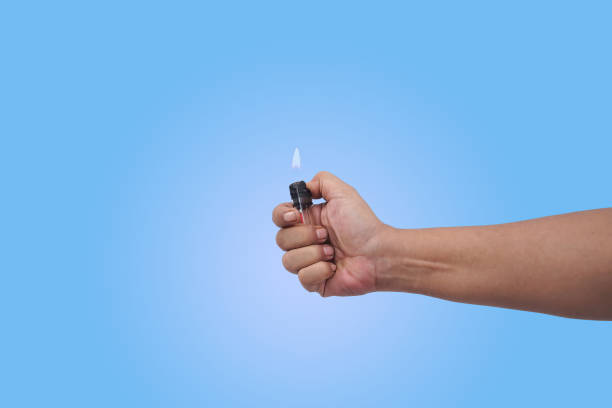 istock close up of hand hold a matches 2152108361