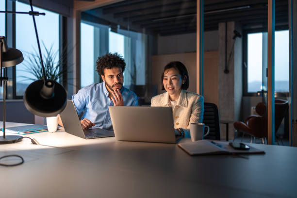 istock Diverse Business Team Working Overtime in Office 2152115947
