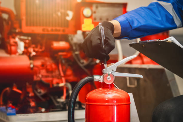 istock Engineer check fire extinguisher tank in the fire control room for safety in factory or industry. 2152117004