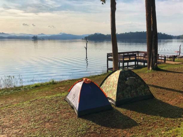 istock camping tents at lake 2152119514