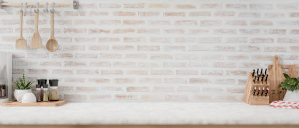 istock A display space on a white kitchen tabletop against the brick wall in a minimalist farmhouse kitchen 2152119866